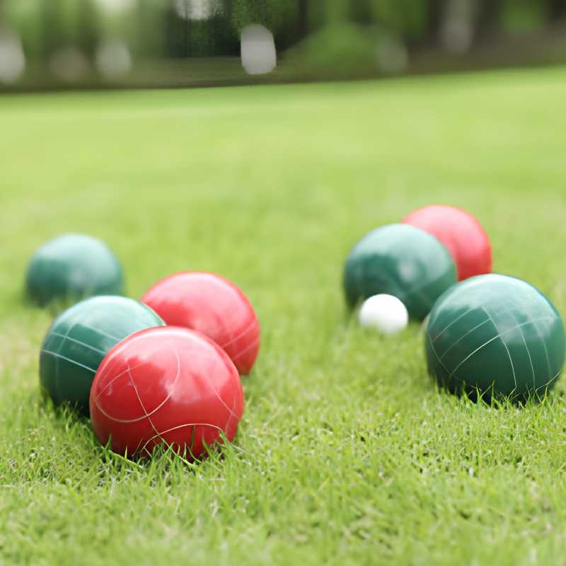 Bocce Resin 7 red and green resin bocce balls on grass