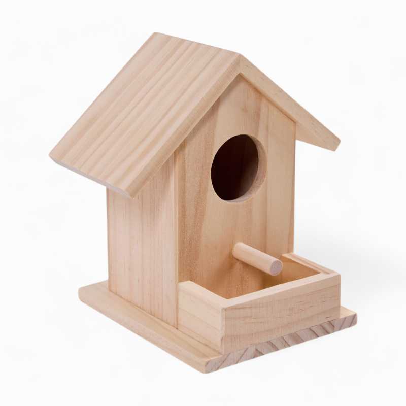wooden bird house with a small perch, feeding tray and a small opening for the birds to go in threw