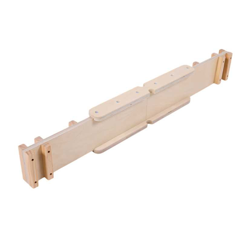 Wooden balance beam laying on it side with a empty back